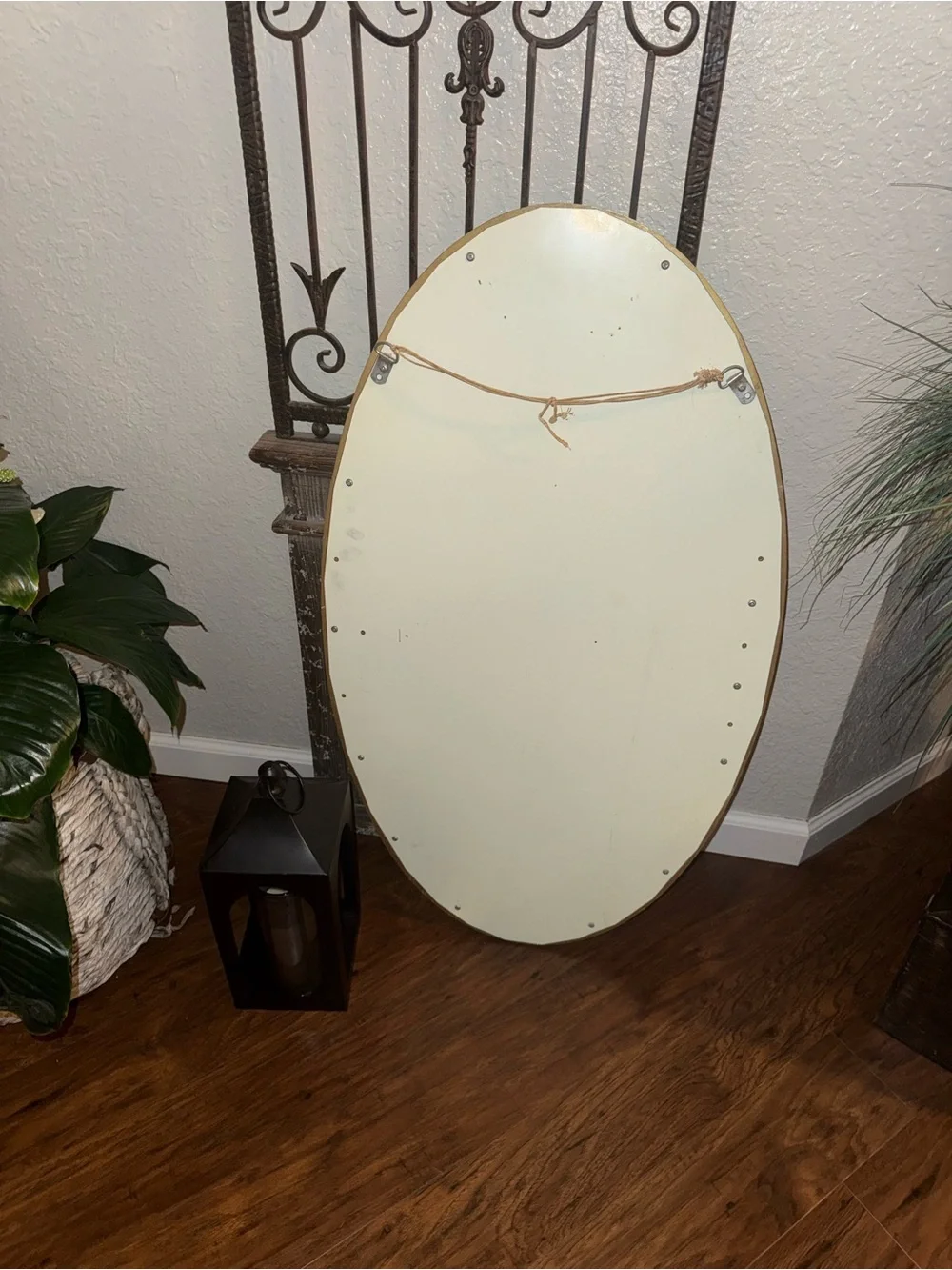 Vintage Oval Wall Mirror Featuring An Ornate, Off-White And Gold-Accented Frame